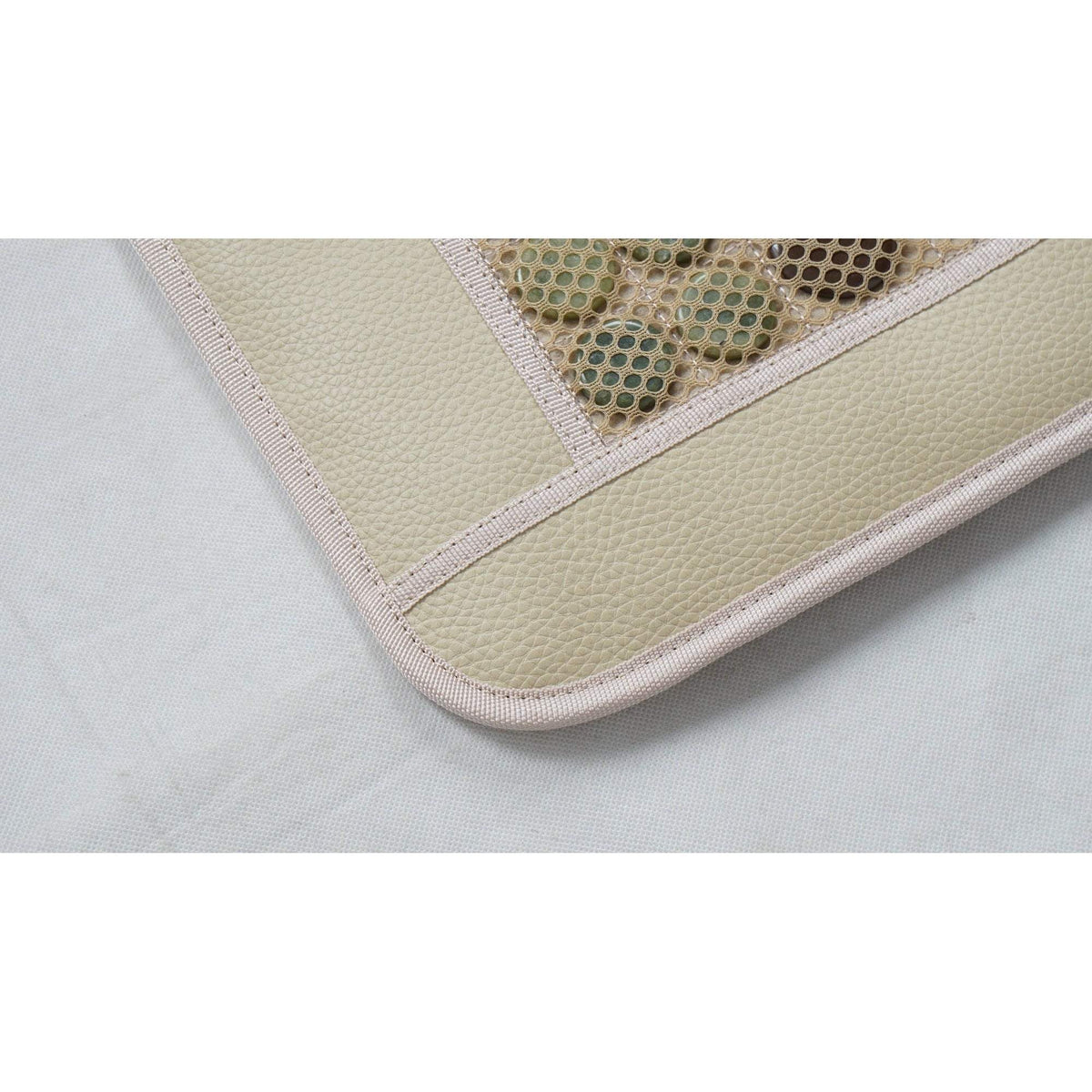 White Jade Tourmaline Infrared Heat Mat by Gemthera, showing its soft fabric surface and embedded gemstone panels for wellness therapy.