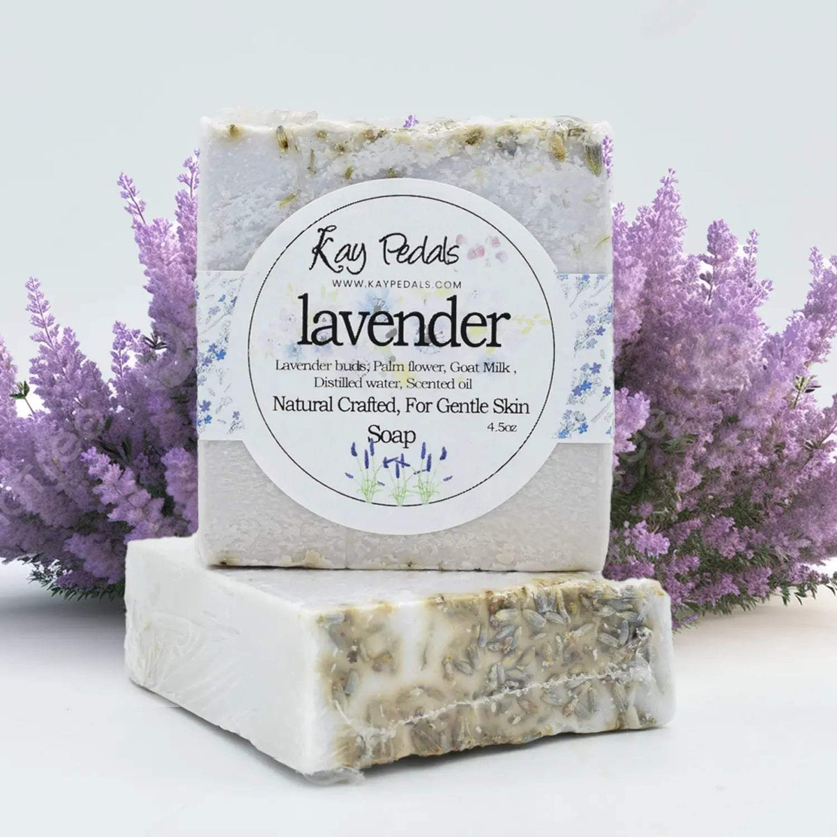 Lavender Natural Soap bar in white with embedded lavender buds, featuring natural handcrafted ingredients and gentle skin care properties.