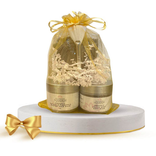Glimmer Goddess Organic Face Mask Gift Set with two masks, spa headband, and applicator brush for at-home facial skincare.