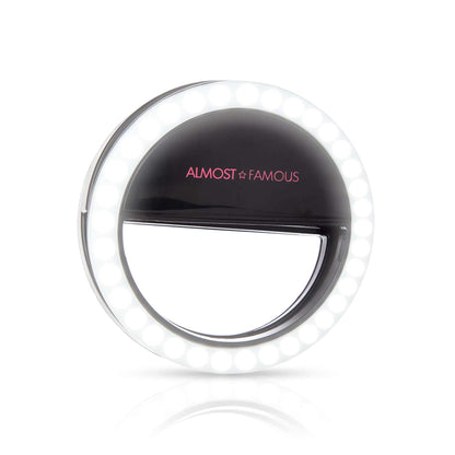 Spotlight Selfie Light in black plastic with circular LED ring and clip-on design for smartphone lighting enhancement.