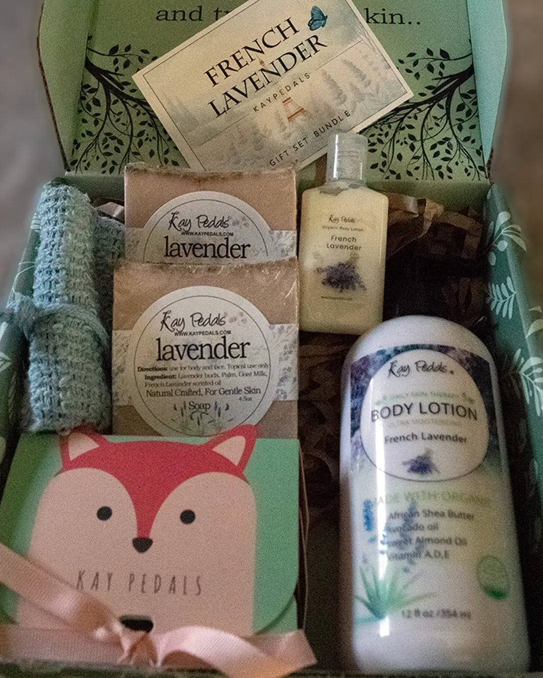 French Lavender Bundle skin care set with body lotion, lavender soap bars, soap pouch, and travel-size lotion in soft pastel packaging