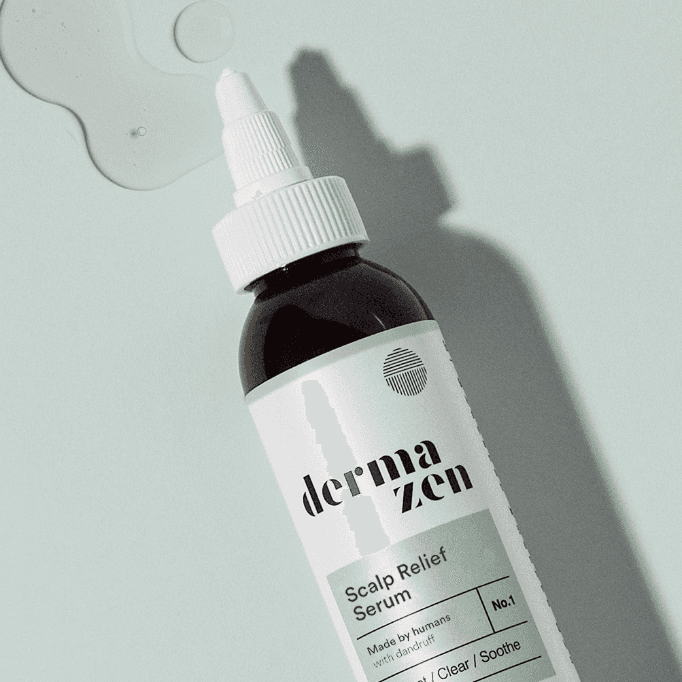 Topical Dermazen Calming Seborrheic Serum bottle with applicator for soothing skin care treatment.