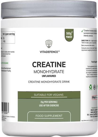Pure unflavored creatine monohydrate powder from Vitadefence in a 500g round silver jar, used as a food supplement for muscle support.