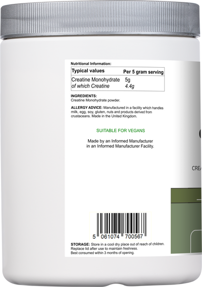 Vitadefence® Creatine Monohydrate powder in a 500g round silver container, side view, unflavored sports supplement.