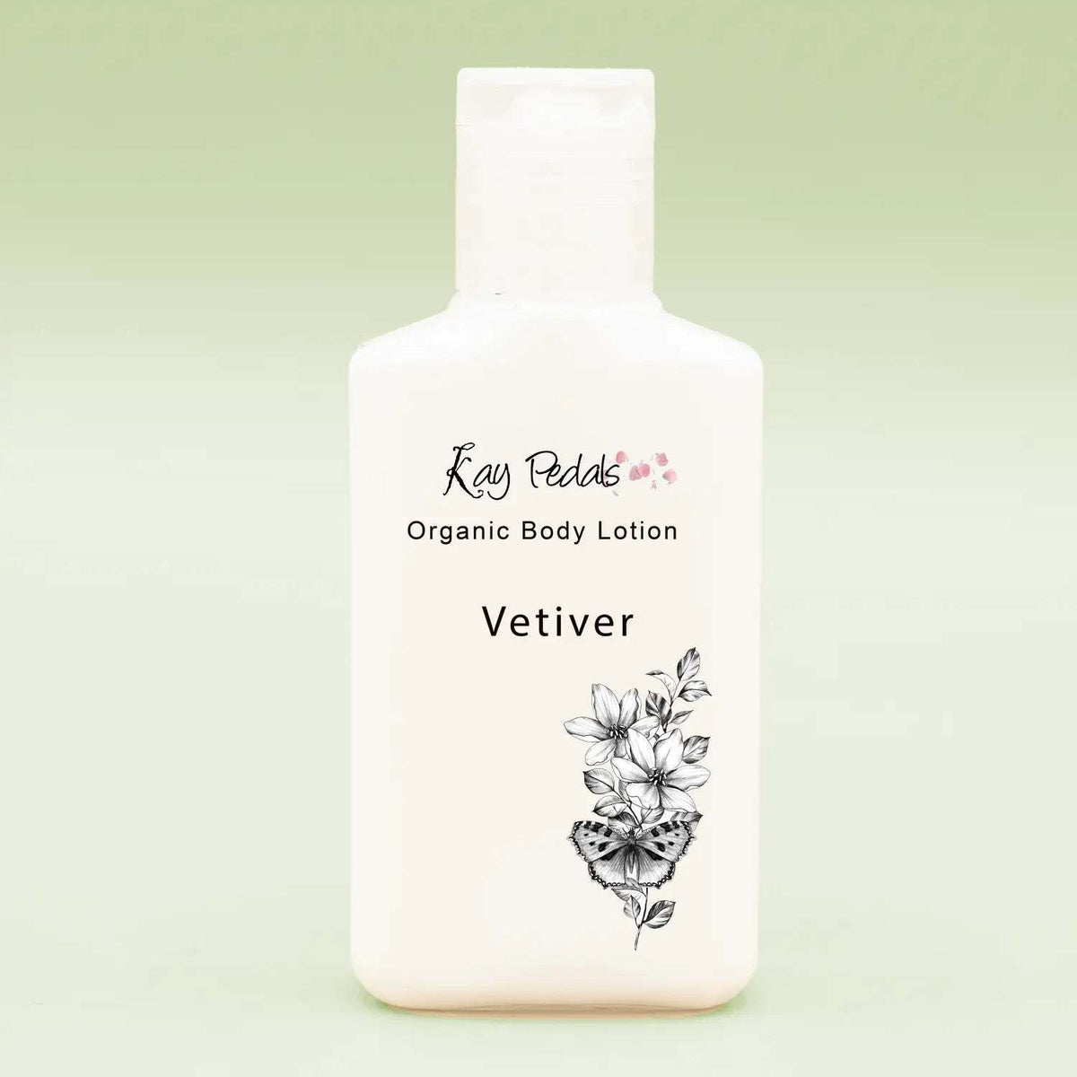 Small white plastic bottle of Kay Pedals Organic Body Lotion vetiver scent with floral and butterfly design, part of Kay Pedals Scent Discovery Trio.