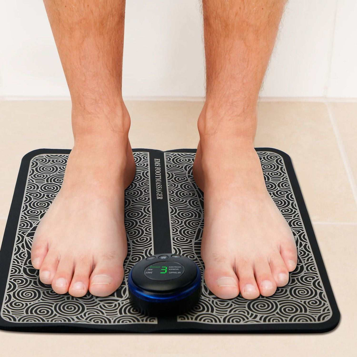 Doba EMS foot massage pad with electric stimulator unit for leg muscle relaxation and pain relief, rechargeable design.