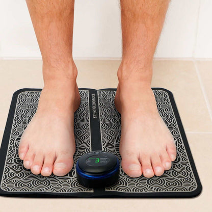 Doba EMS foot massage pad with electric stimulator unit for leg muscle relaxation and pain relief, rechargeable design.