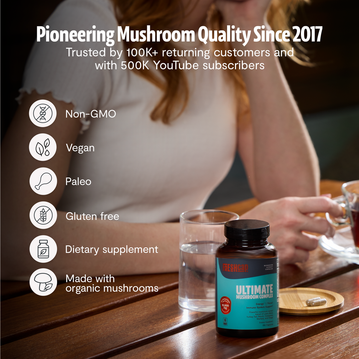 FreshCap Mushrooms Organic Mushroom Complex supplement capsules, showing a close-up of the capsule bottle with capsules inside.