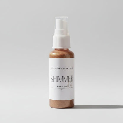 Vitamin E Shimmer Body Oil in a clear spray bottle with bronze shimmer oil and a white label and cap